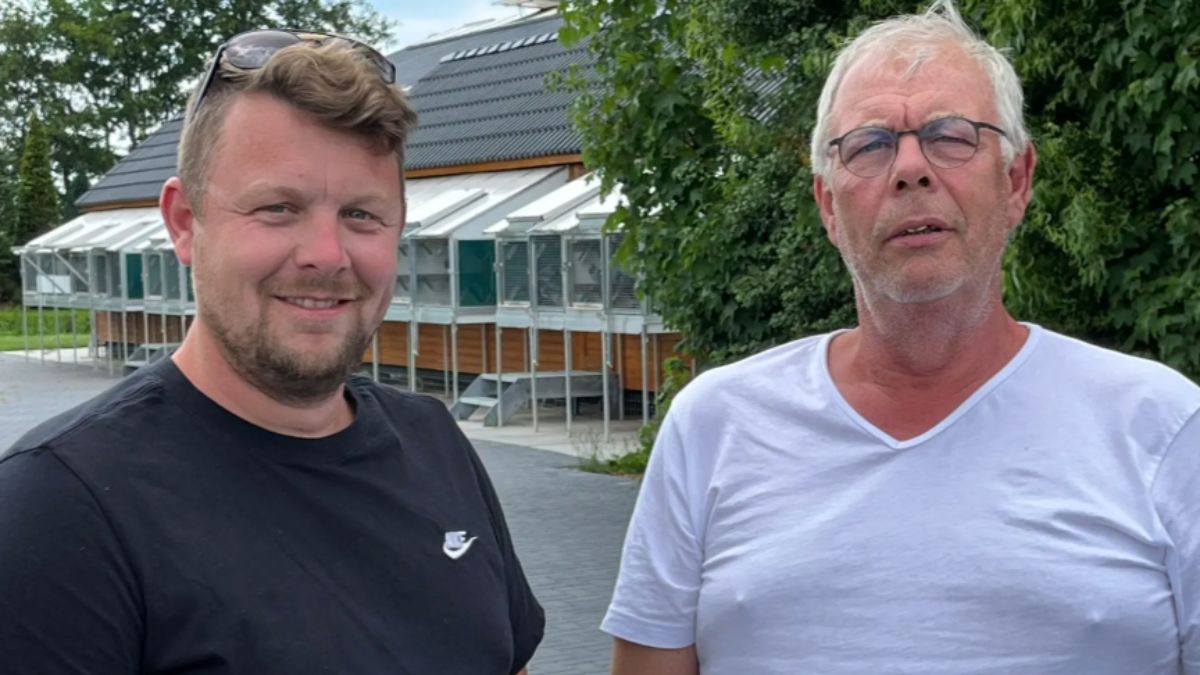 Father and son duo Dolf and Ruud Bakker from Bakker Pigeons celebrating their monumental provincial racing victory with genuine smiles, showcasing the deep passion and family bond in modern pigeon racing.