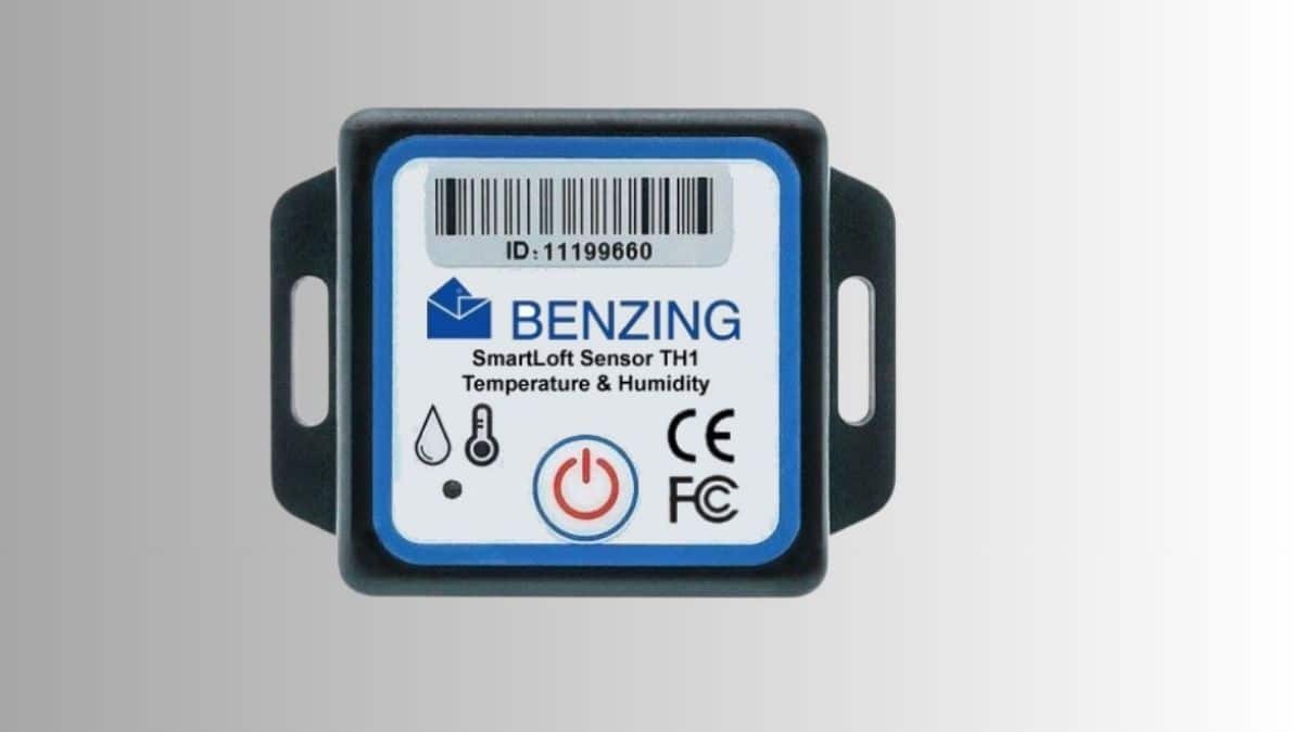 A close up shot of the sleek Benzing Smart Loft Sensor, a compact and modern climate monitoring device designed to track temperature and humidity inside a professional pigeon loft.