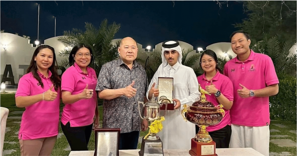 Home 5 Six people stand behind award trophies and plaques at an evening celebration connected with Al Tahadi Loft Owned by Khater Rashid Alkhater